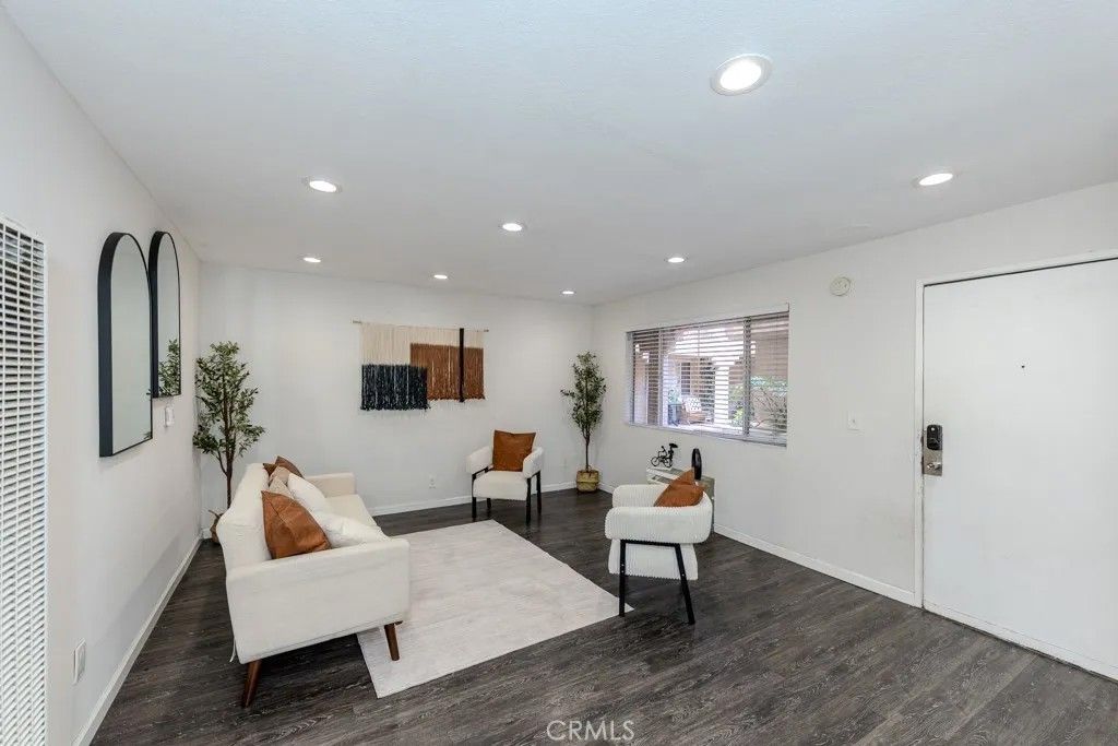 Photo of 6100 Rugby Avenue #108, Huntington Park, CA 90255 (MLS # OC25239717)