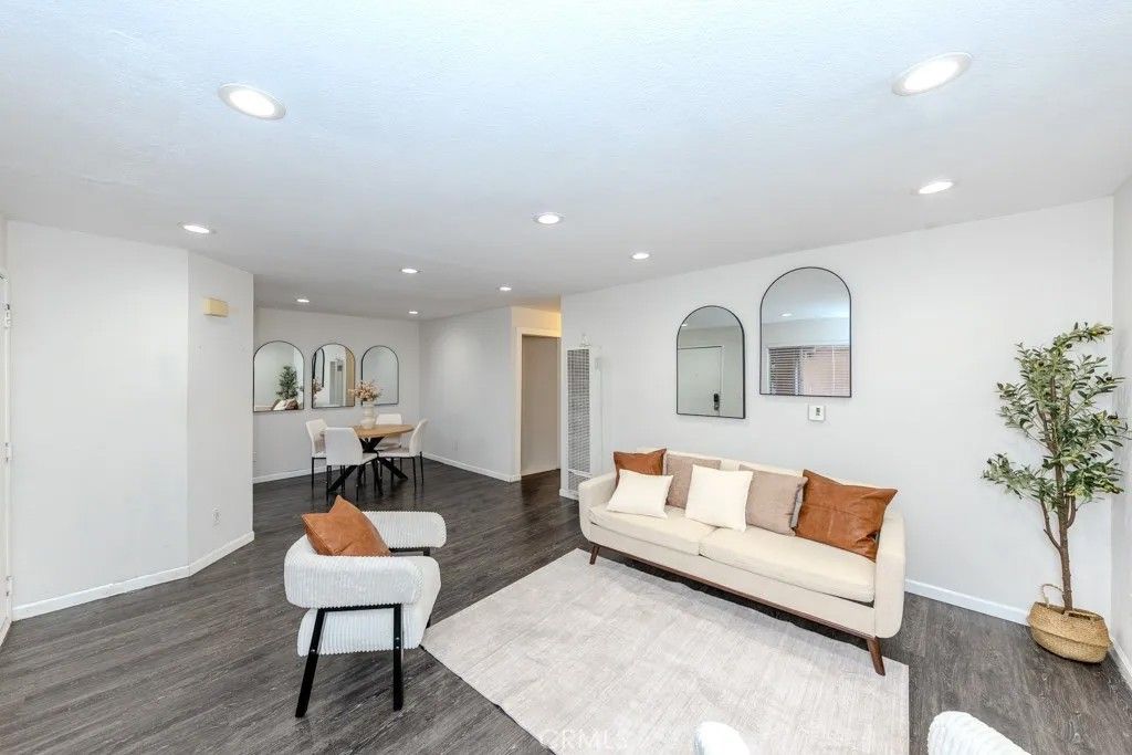 Photo of 6100 Rugby Avenue #108, Huntington Park, CA 90255 (MLS # OC25239717)