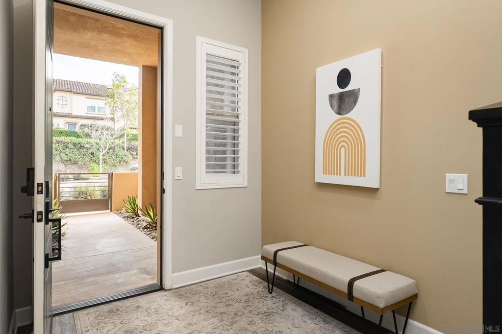 Photo of 16750 Coyote Bush Dr #31, San Diego, CA 92127 (MLS # 260002214)