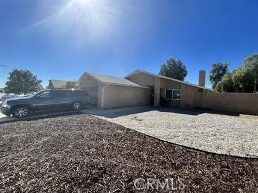 Photo of 12541 Softwind Dr, Moreno Valley, CA 92553 (MLS # SW26078599)