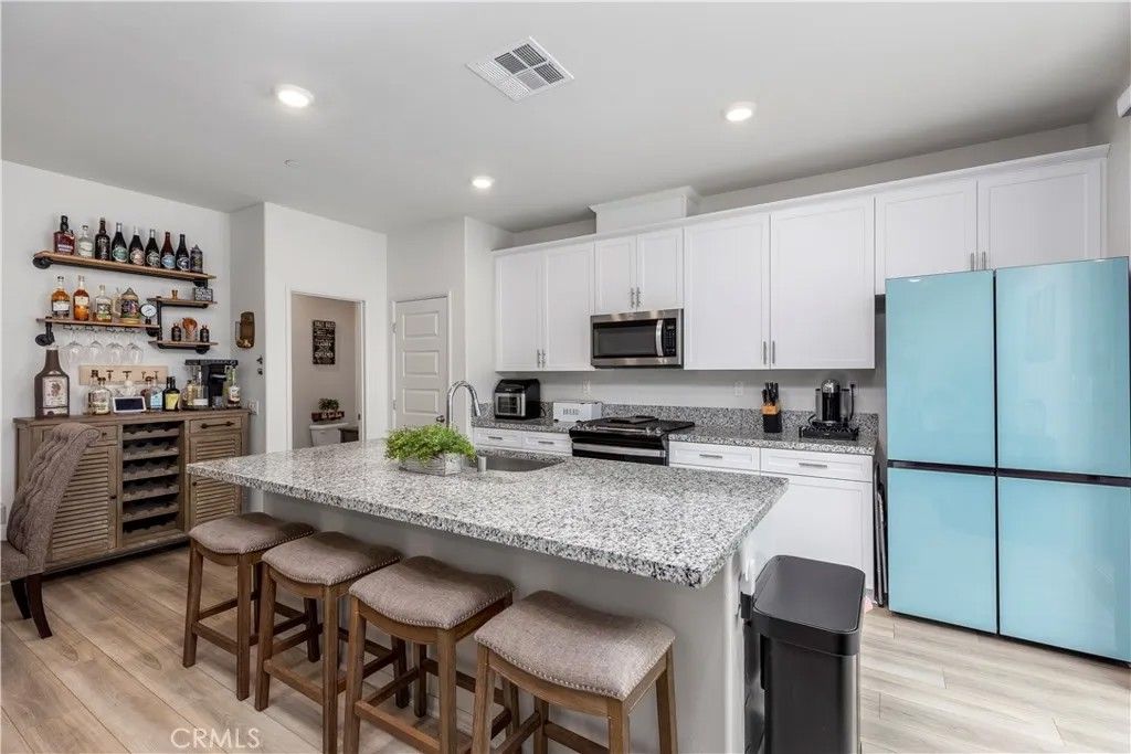 Photo of 40630 Birchfield Drive #12, Temecula, CA 92591 (MLS # SW26111405)