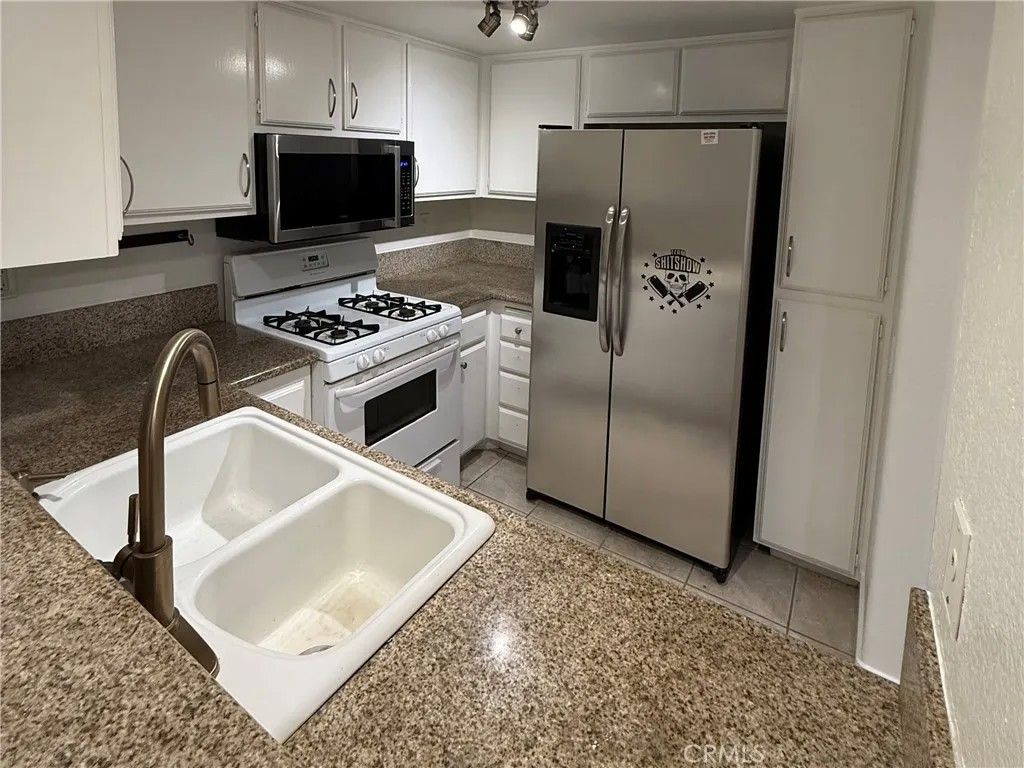 Photo of 445 Ribbon Beach Way #278, Oceanside, CA 92058 (MLS # OC26005340)