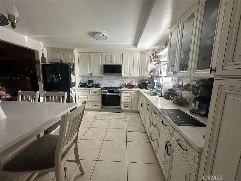 Photo of 10135 Nichols Street, Bellflower, CA 90706 (MLS # DW26083853)