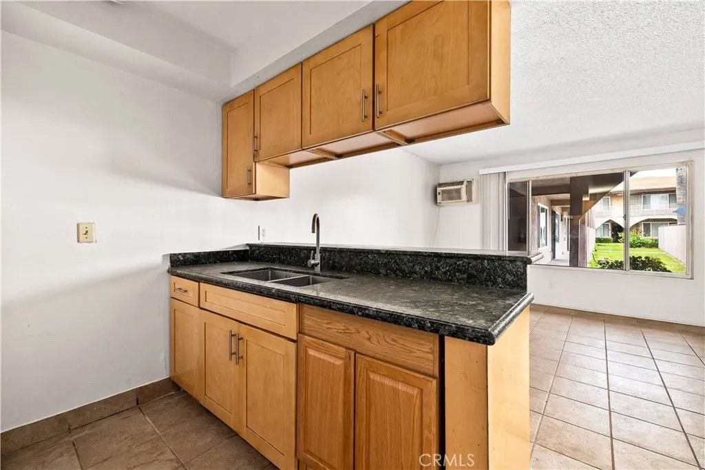 Photo of 10030 Alondra Blvd #25, Bellflower, CA 90706 (MLS # OC26084210)