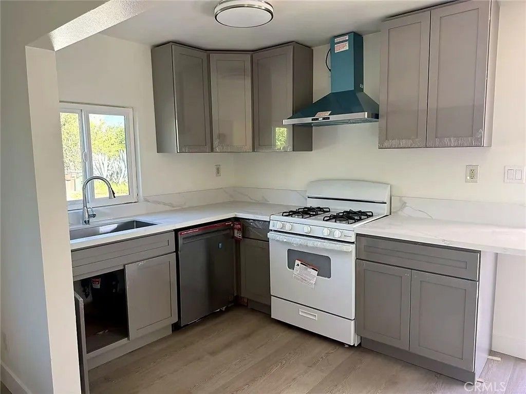 Photo of 8717 Tilmont Ave, Pico Rivera, CA 90660 (MLS # TR26056289)