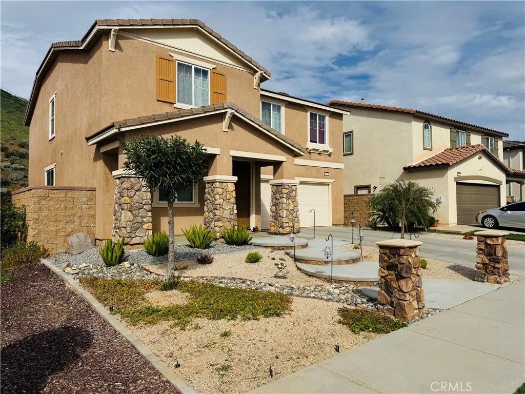 Photo of 34322 Blossoms Drive, Lake Elsinore, CA 92532 (MLS # IV26036070)