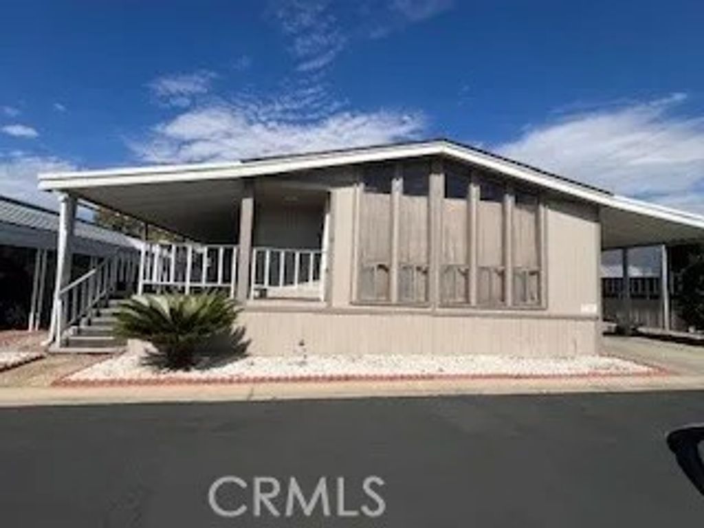 Photo of 23820 Ironwood Ave #143, Moreno Valley, CA 92557 (MLS # IV25244865)