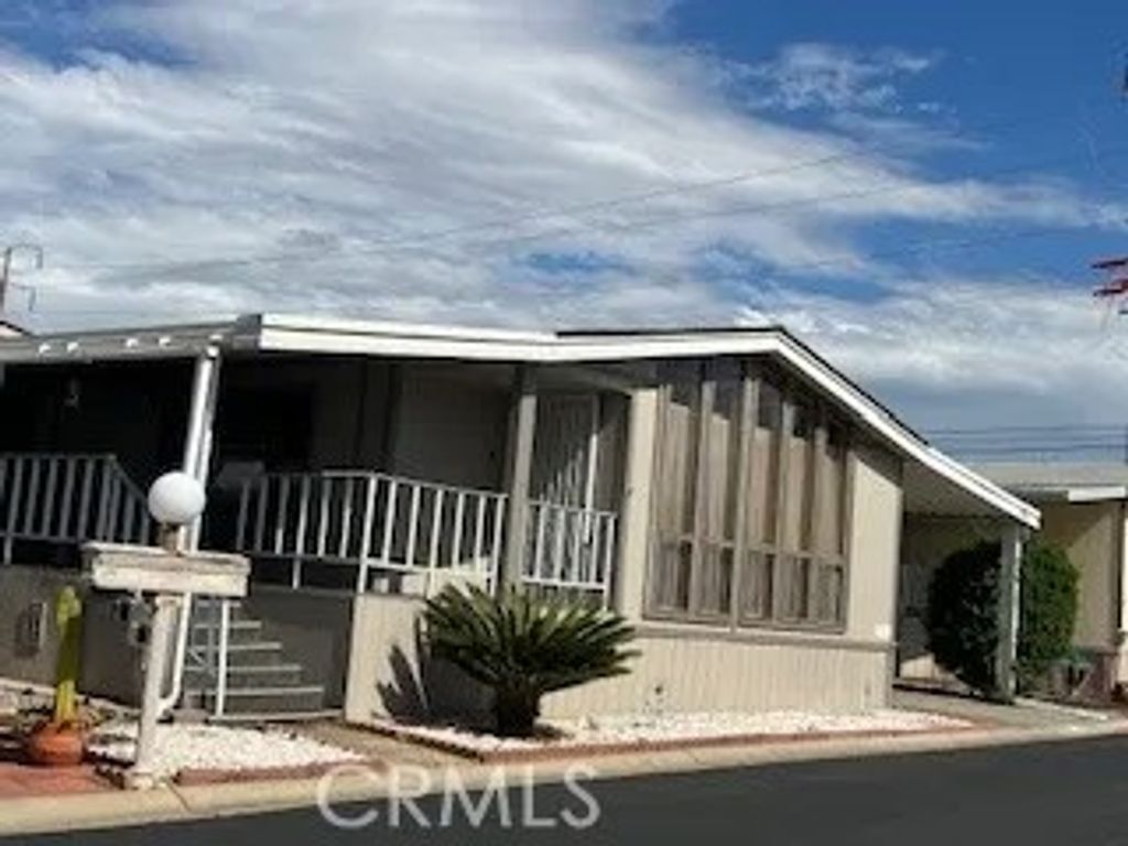 Photo of 23820 Ironwood Ave #143, Moreno Valley, CA 92557 (MLS # IV25244865)