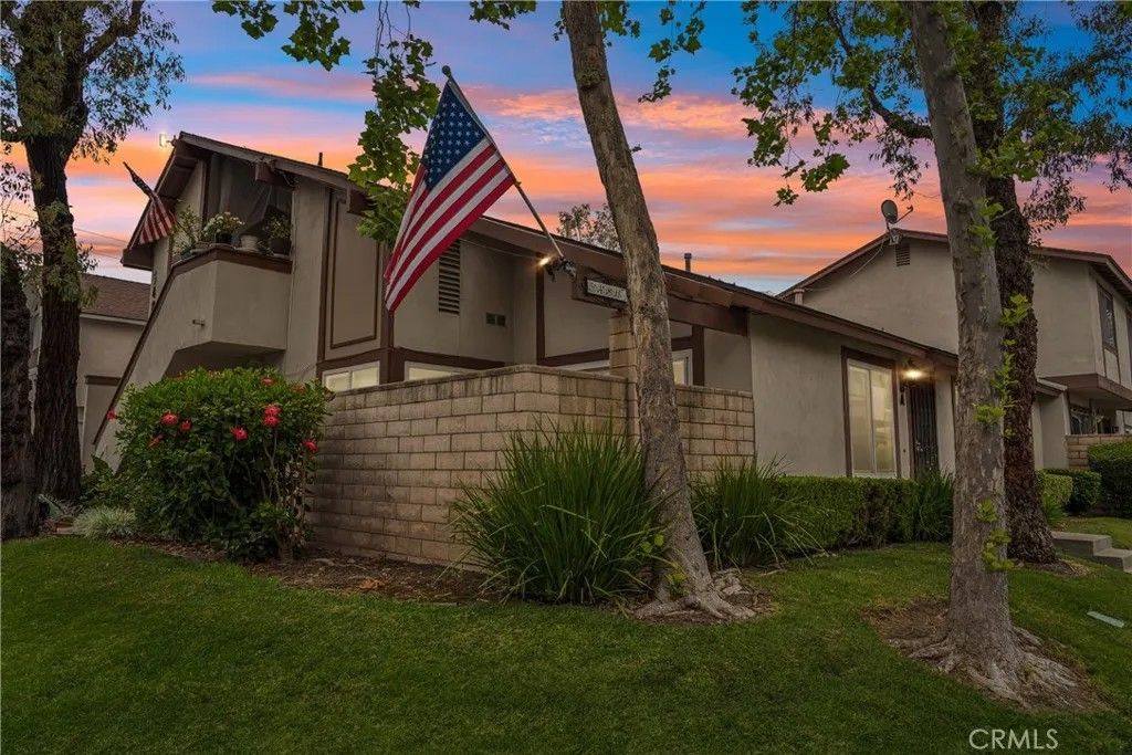 Photo of 5486 E Willow Woods Lane #101, Anaheim, CA 92807 (MLS # OC26069665)