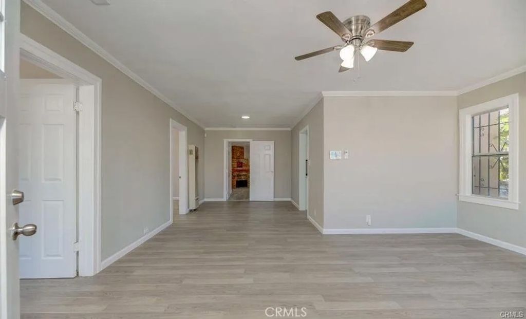 Photo of 542 W 105th Street, Los Angeles, CA 90044 (MLS # OC25266071)