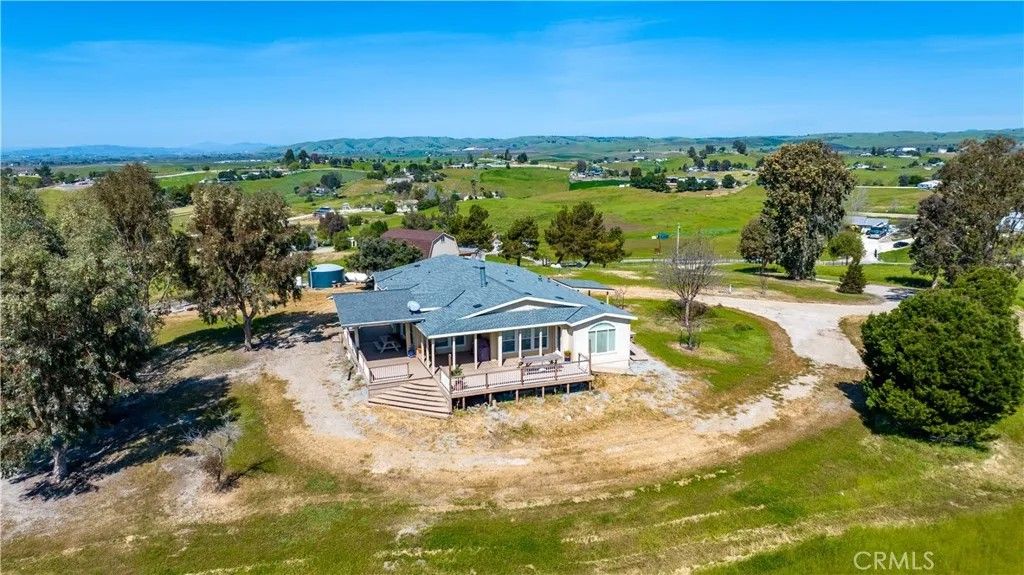 Photo of 1876 Rancho Lomas Way, San Miguel, CA 93451 (MLS # NS26073940)