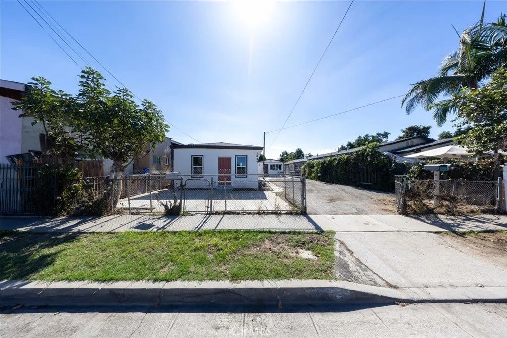 Photo of 1844 E 62nd ST, Los Angeles, CA 90001 (MLS # IV26234301)