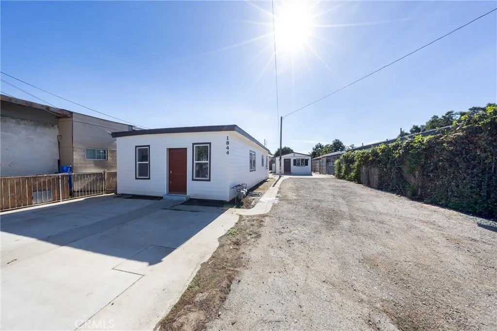 Photo of 1844 E 62nd ST, Los Angeles, CA 90001 (MLS # IV26234301)