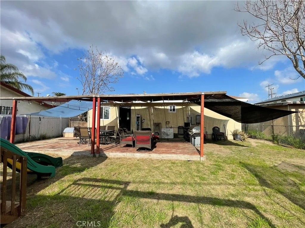 Photo of 1648 E 110th St, Los Angeles, CA 90059 (MLS # DW26033538)