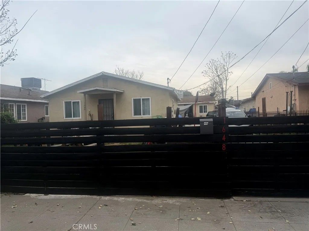 Photo of 1648 E 110th St, Los Angeles, CA 90059 (MLS # DW26033538)