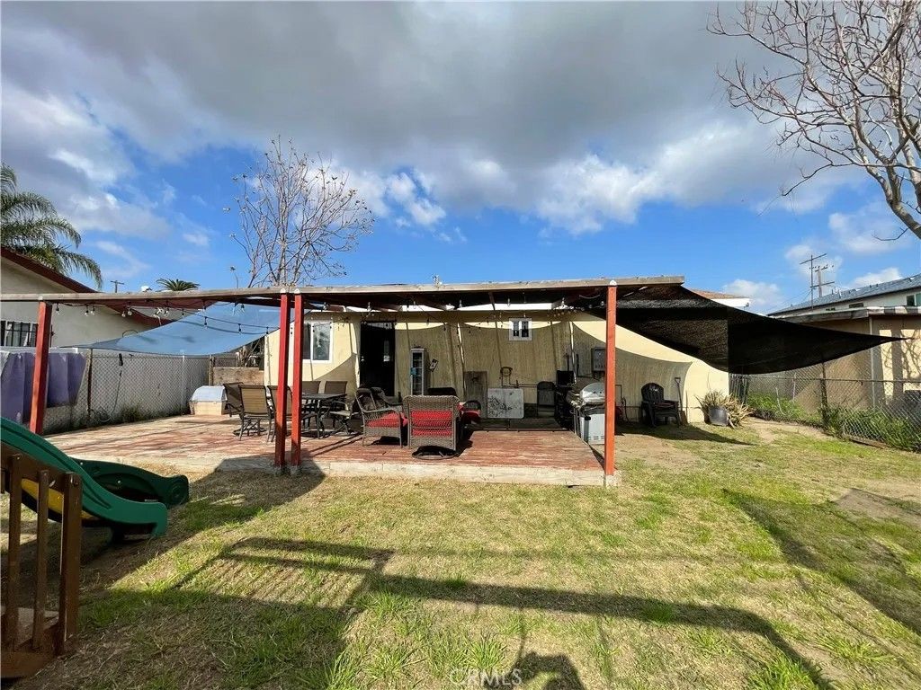 Photo of 1648 E 110th St, Los Angeles, CA 90059 (MLS # DW26033538)