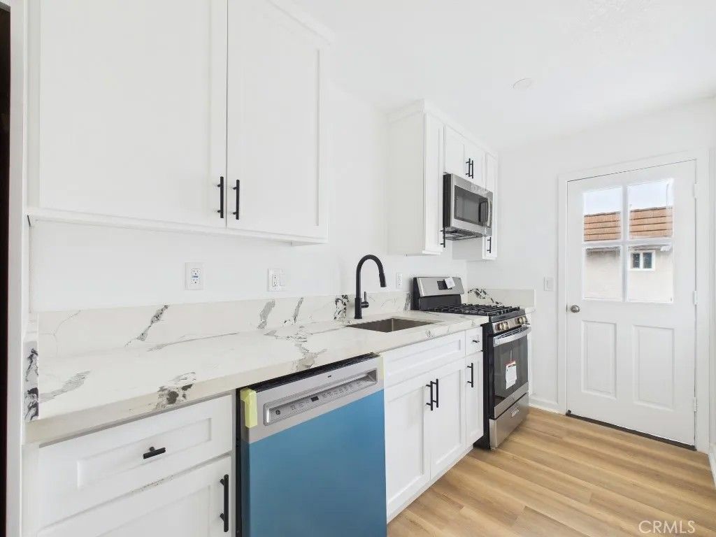 Photo of 16951 Hoskins St #5, Huntington Beach, CA 92649 (MLS # PW26082902)