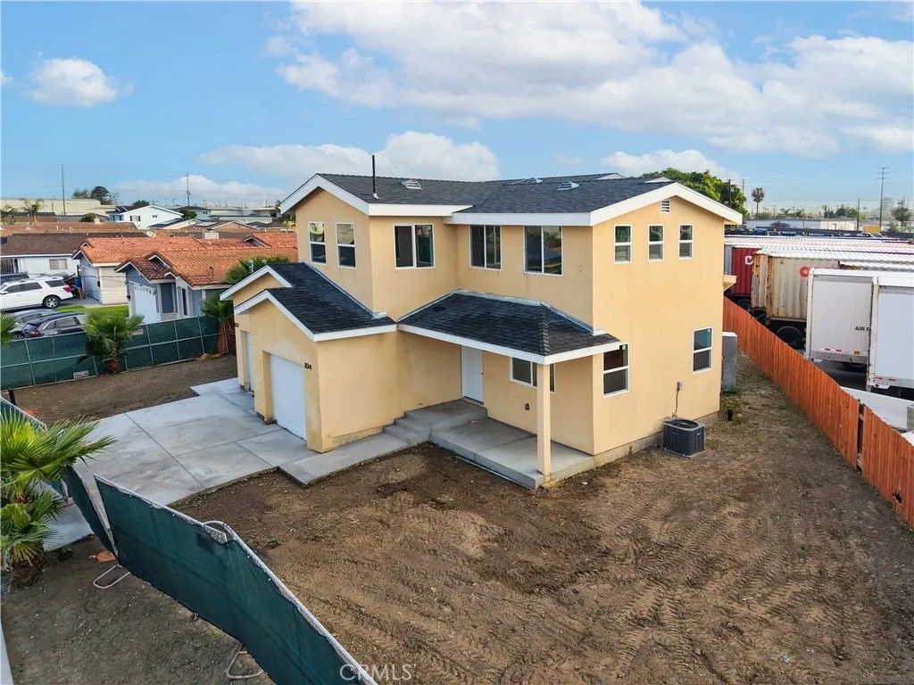 Photo of 832 Mcfarland Ave, Wilmington, CA 90744 (MLS # DW26046740)