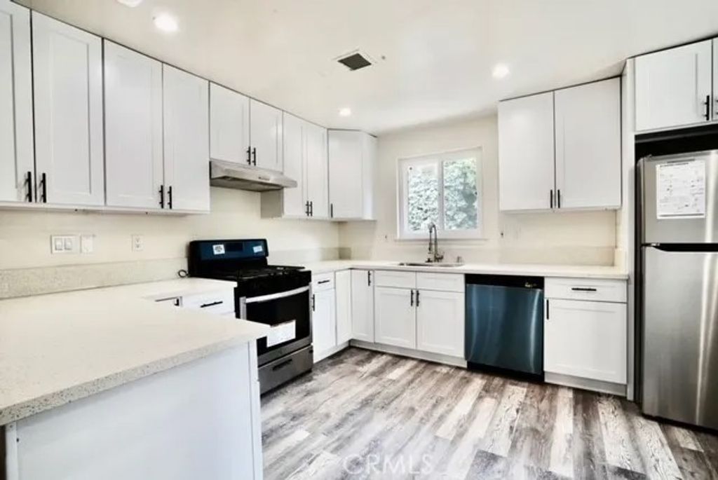 Photo of 22148 Welby Way, Woodland Hills, CA 91303 (MLS # SR25272992)