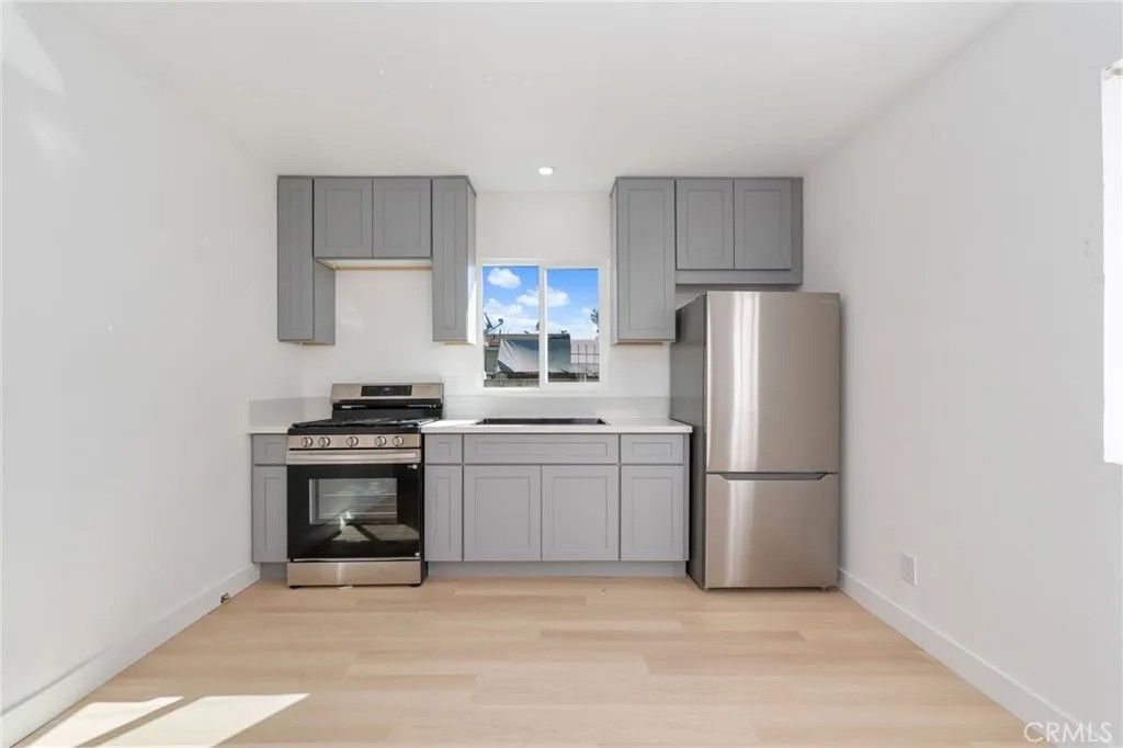 Photo of 240 E 84 Th, Los Angeles, CA 90003 (MLS # DW26044707)