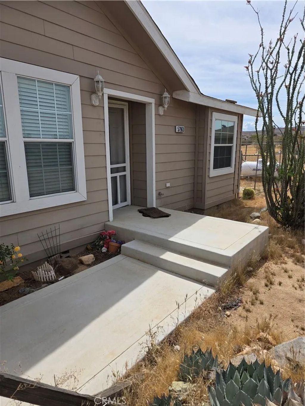Photo of 57963 Campanula ST, Yucca Valley, CA 92284 (MLS # IG26095879)