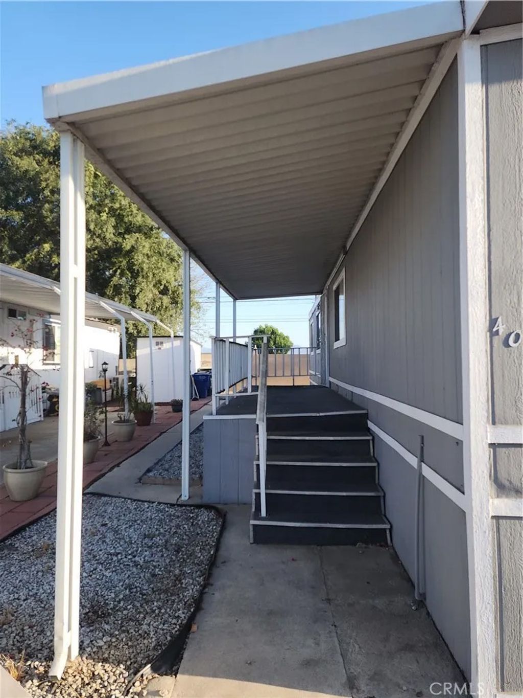 Photo of 1855 E Riverside Dr #409, Ontario, CA 91761 (MLS # CV26093316)