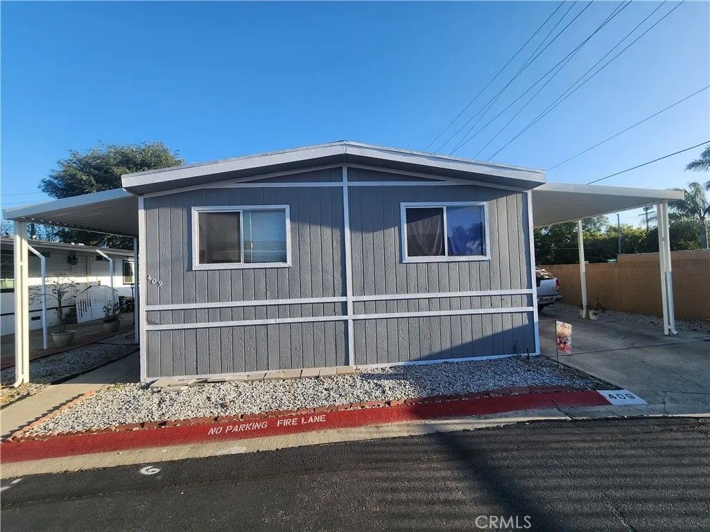 Photo of 1855 E Riverside Dr #409, Ontario, CA 91761 (MLS # CV26093316)