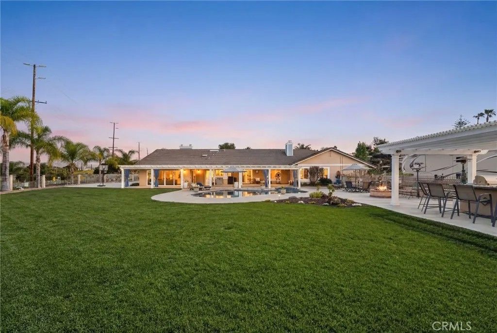 Photo of 15555 Rancho Viejo Drive, Riverside, CA 92506 (MLS # IV26059970)