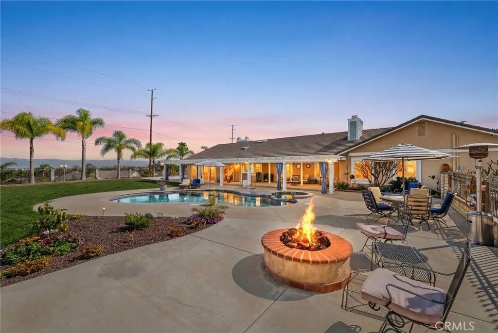 Photo of 15555 Rancho Viejo Drive, Riverside, CA 92506 (MLS # IV26059970)