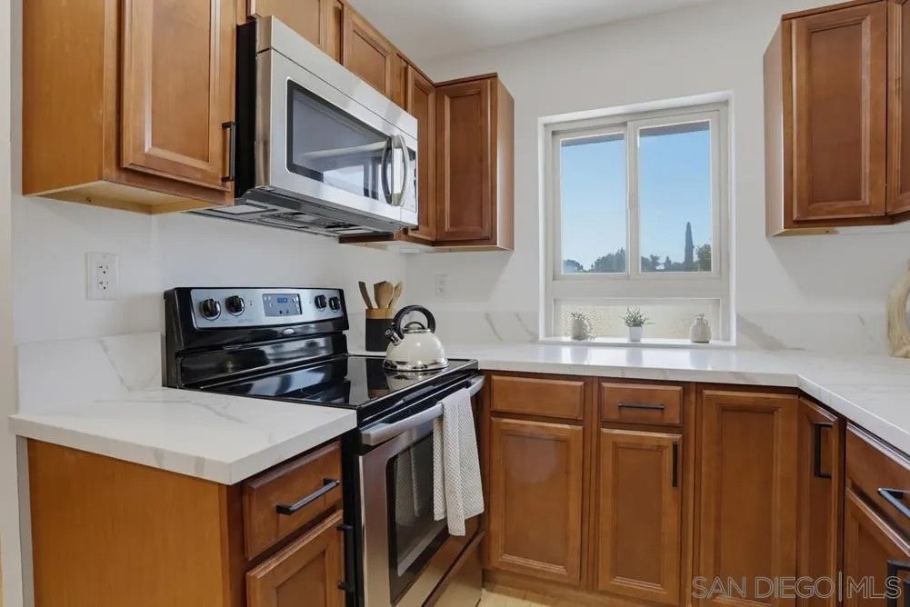Photo of 5700 Baltimore DR #146, La Mesa, CA 91942 (MLS # 260016620)