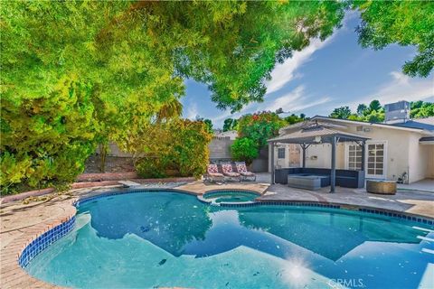 Photo of 21711 Mulholland, Woodland Hills, CA 91364 (MLS # SR25277705)
