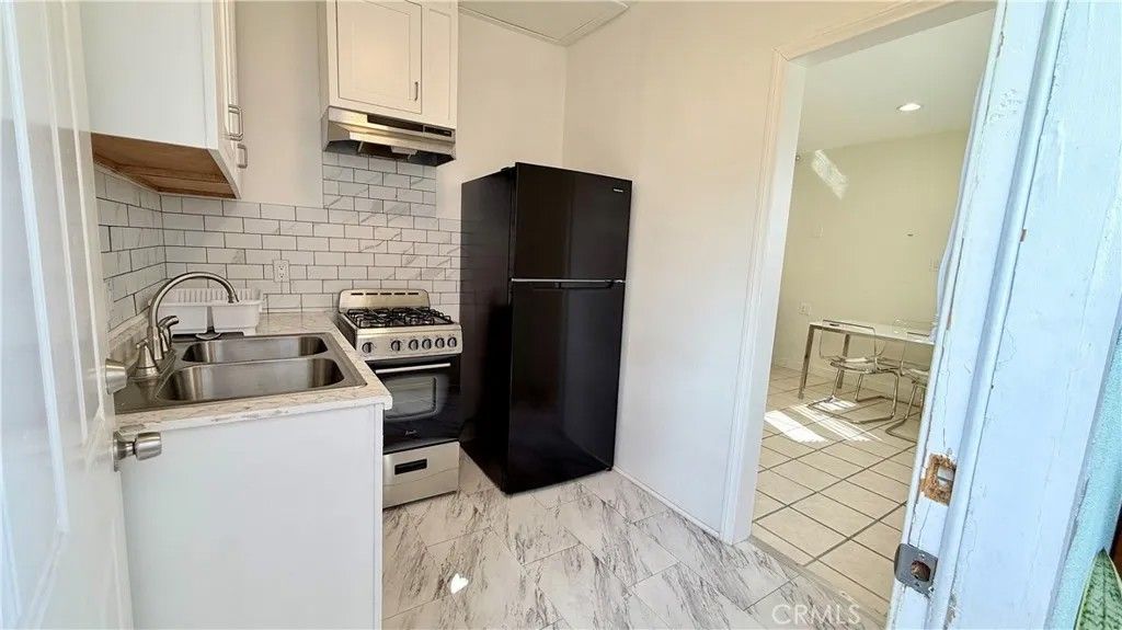 Photo of 8146 Matilija Ave, Panorama City, CA 91402 (MLS # GD26091426)
