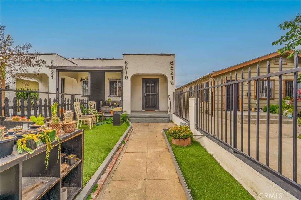 Photo of 6519 Denver Avenue, Los Angeles, CA 90044 (MLS # DW26016403)