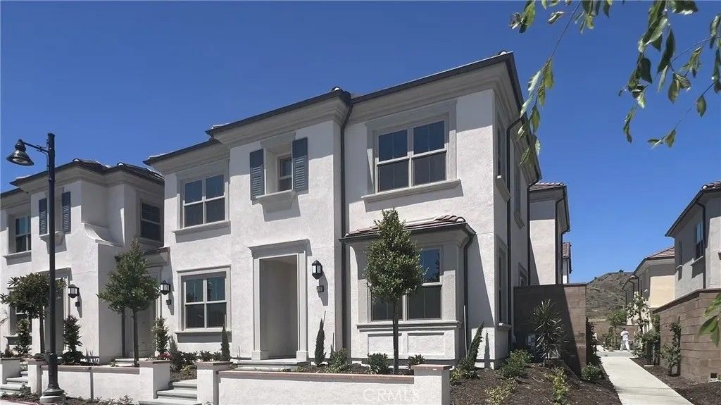 Photo of 110 Sunnyside, Irvine, CA 92618 (MLS # OC26090358)