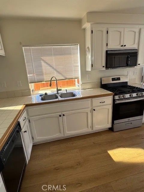 Photo of 2180 Anda Lucia Way, Oceanside, CA 92056 (MLS # OC26011244)