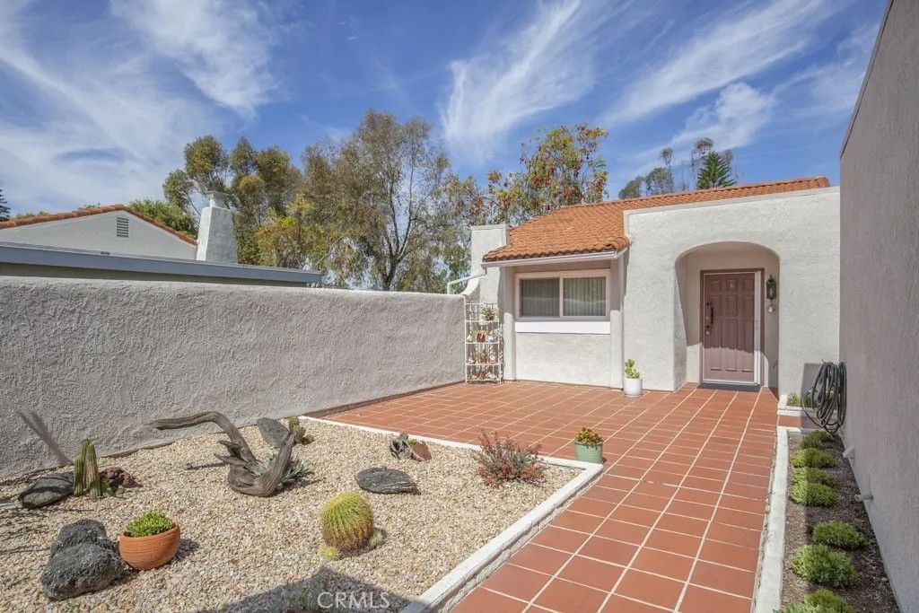 Photo of 5479 Paseo Del Lago #A, Laguna Woods, CA 92637 (MLS # OC26082044)