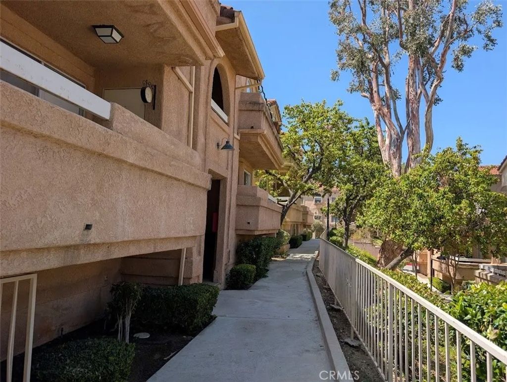 Photo of 19849 Sandpiper Pl #133, Newhall, CA 91321 (MLS # SR26095460)