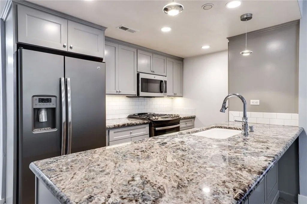 Photo of 11630 Warner Ave #414, Fountain Valley, CA 92708 (MLS # OC26002100)