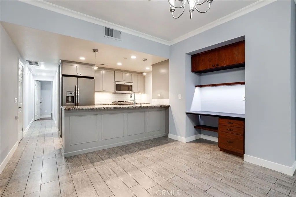 Photo of 11630 Warner Ave #414, Fountain Valley, CA 92708 (MLS # OC26002100)