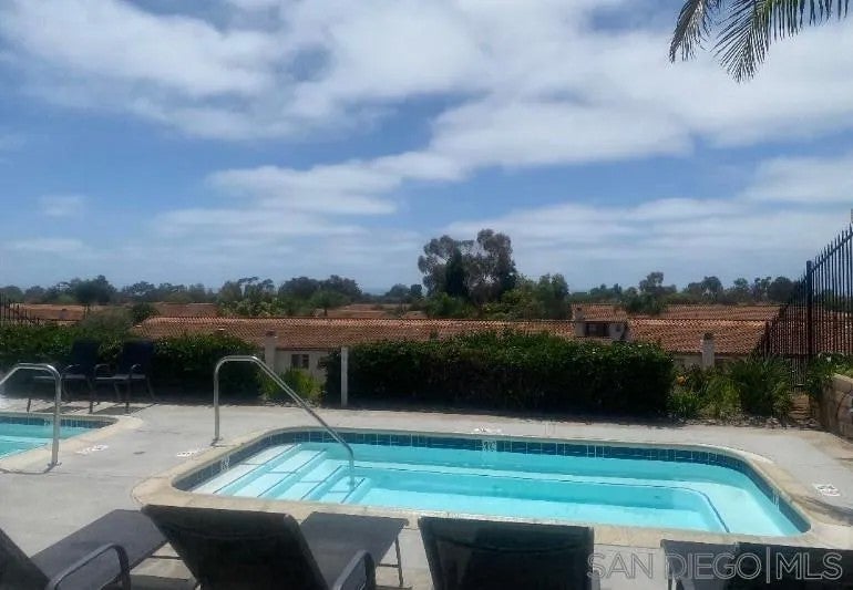Photo of 6854 Maple Leaf Dr, Carlsbad, CA 92011 (MLS # 260015452)
