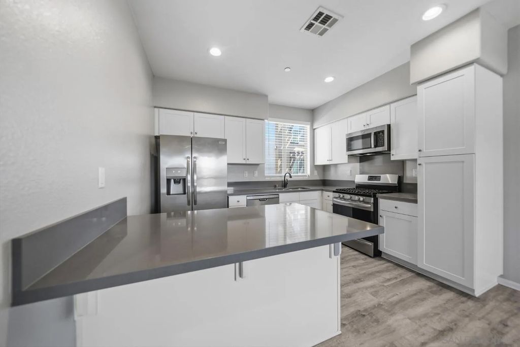 Photo of 8850 Olive Lane #16, Santee, CA 92071 (MLS # 260006933)