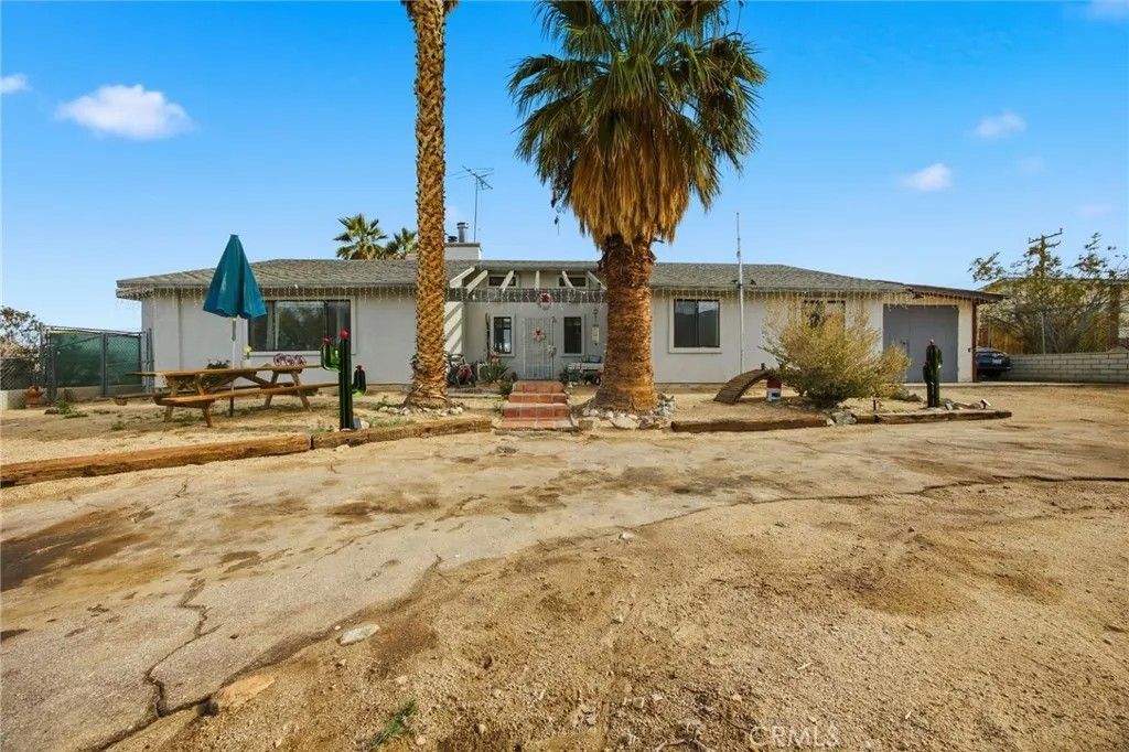 Photo of 7725 Sahara Ave, 29 Palms, CA 92277 (MLS # TR25281520)