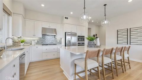 Photo of 401 Mulligan, Irvine, CA 92618 (MLS # OC25235235)
