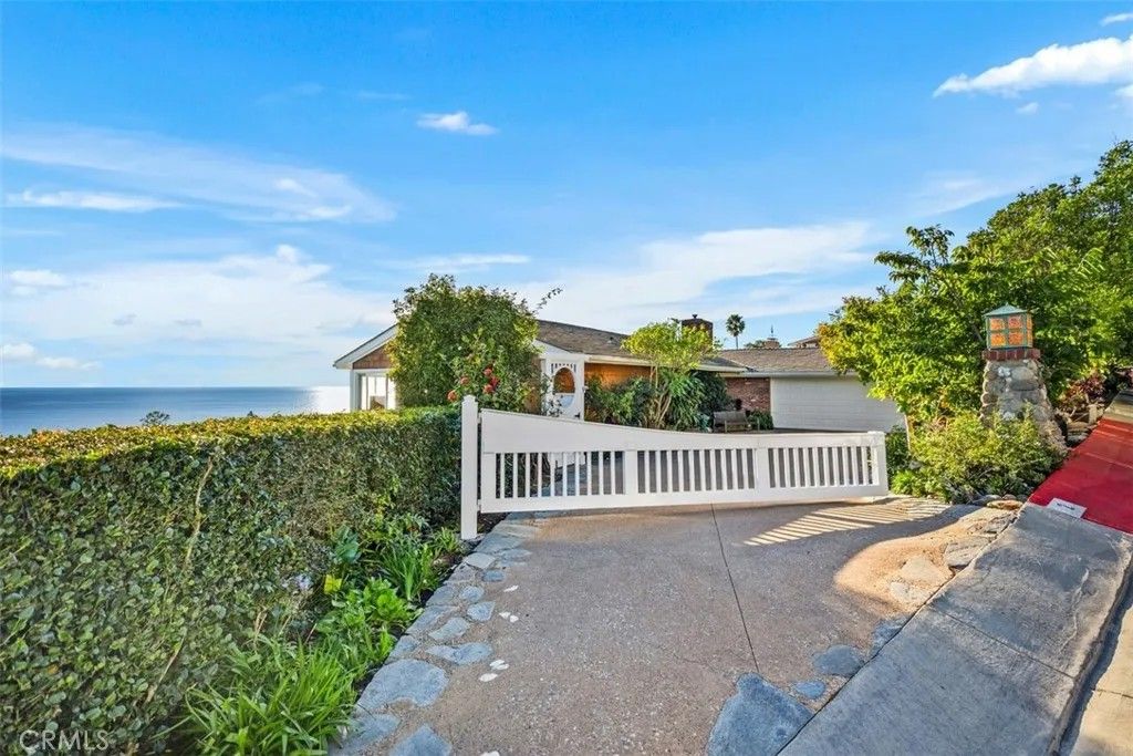 Photo of 2 N Vista De La Luna, Laguna Beach, CA 92651 (MLS # LG26007209)