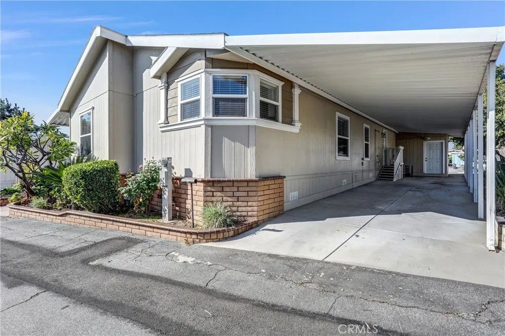 Photo of 3530 Damien Ave #83, La Verne, CA 91750 (MLS # CV25270113)