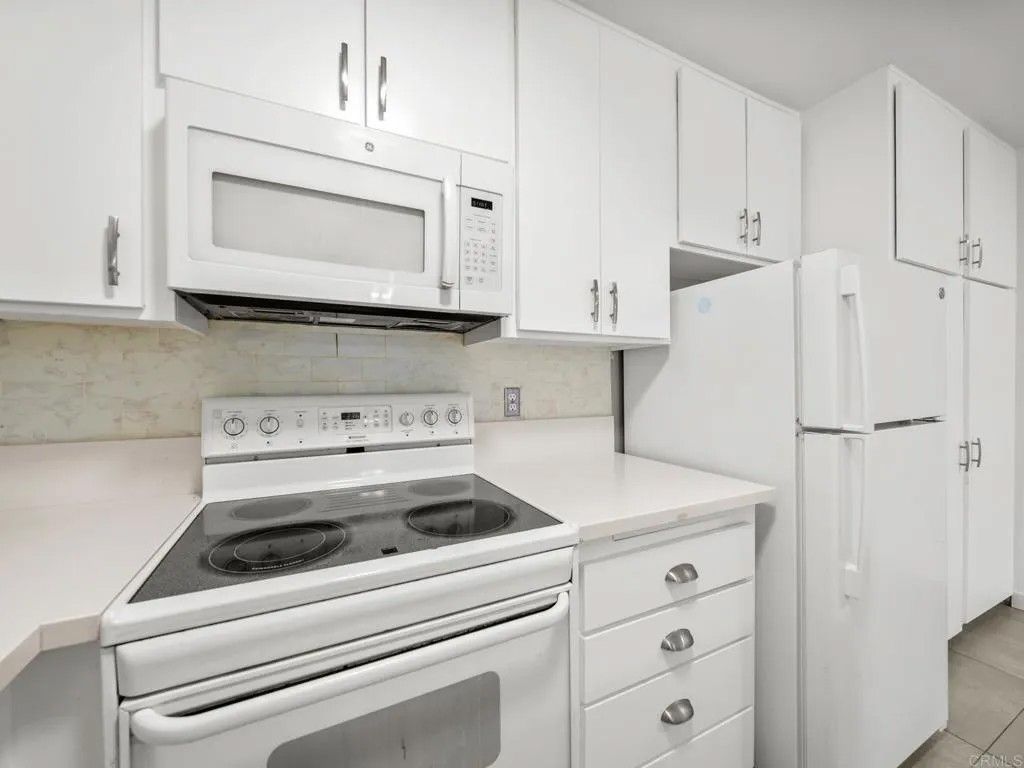 Photo of 6390 Rancho Mission Road #202, San Diego, CA 92108 (MLS # PTP2601445)