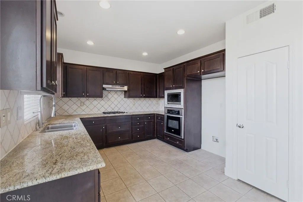 Photo of 19690 Berrywood Dr, Lake Elsinore, CA 92530 (MLS # IG26001627)