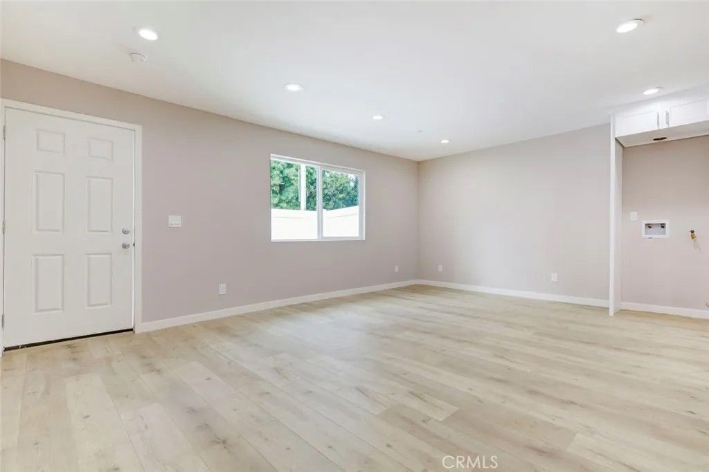 Photo of 7302 N Firmament Avenue, Van Nuys, CA 91406 (MLS # GD26051308)