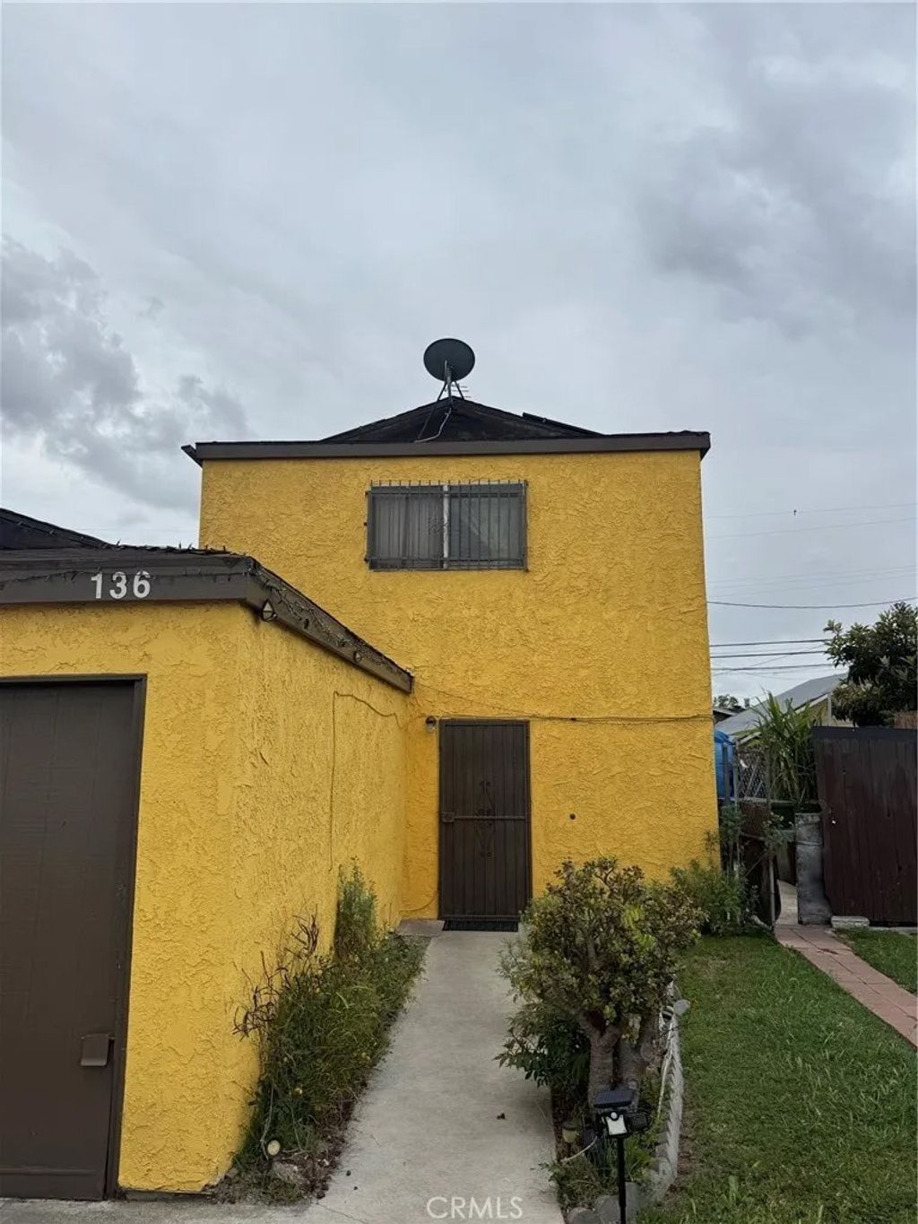 Photo of 136 W 87th Pl, County - Los Angeles, CA 90003 (MLS # DW26087561)
