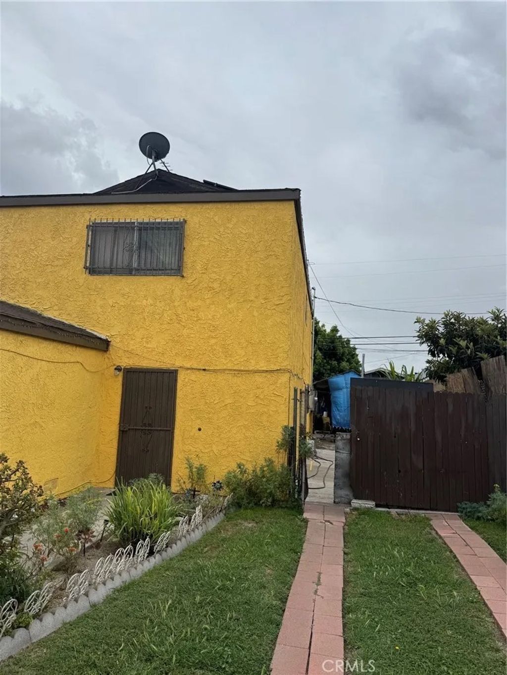 Photo of 136 W 87th Pl, County - Los Angeles, CA 90003 (MLS # DW26087561)